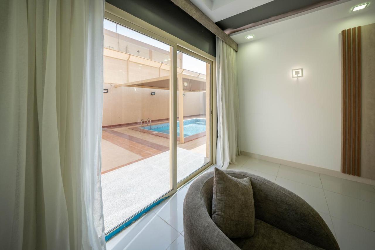 Mirada Gold Jizan - Resort & Private Pools Esterno foto A sliding window